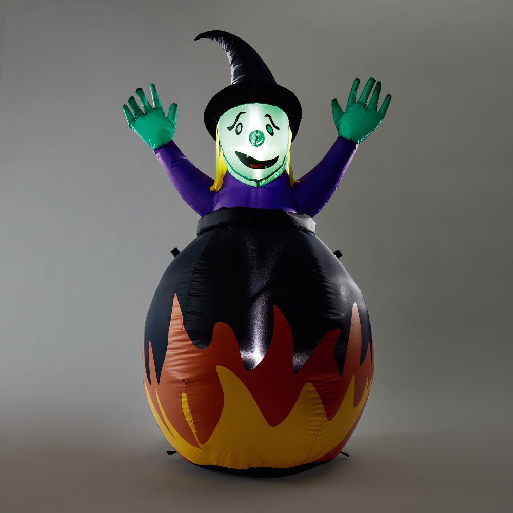 Inflatable witch and cauldron